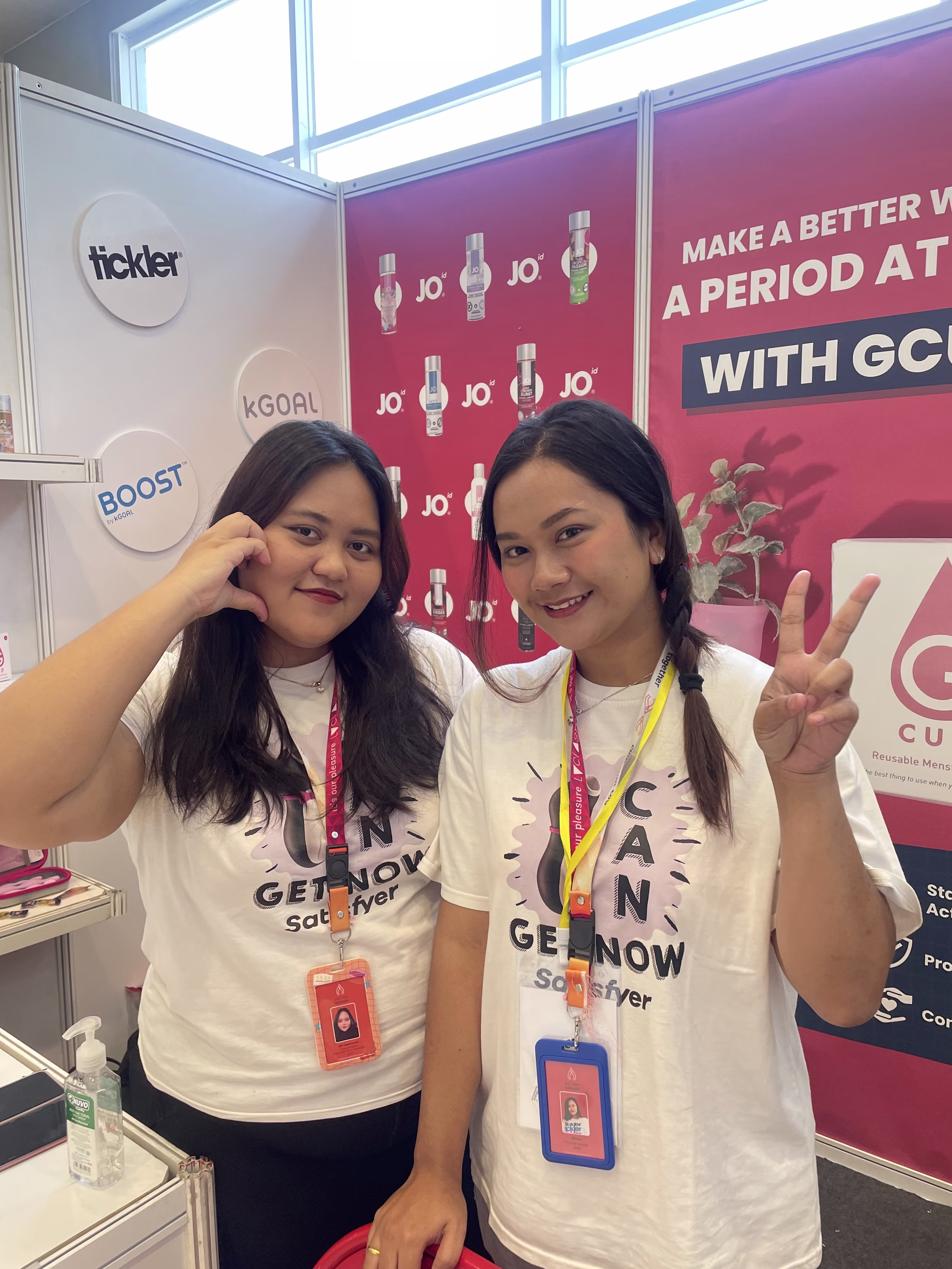Members of the Laciasmara team smiling at the Laciasmara booth during SIMNAS ASI 2023